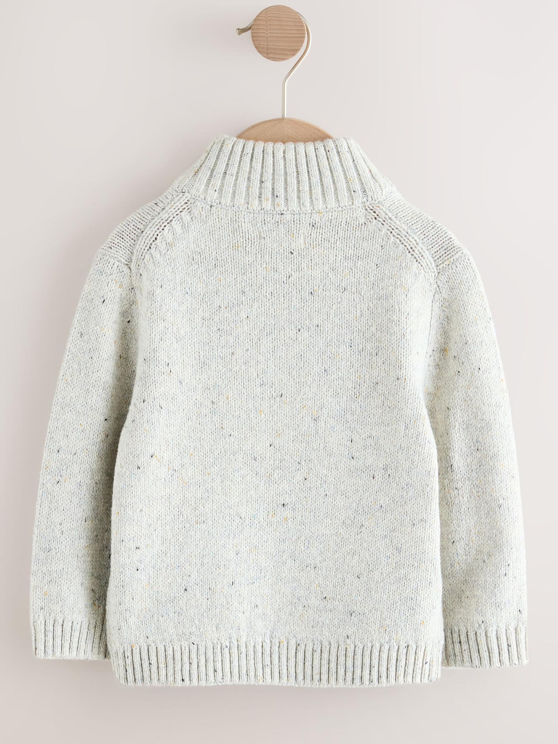 Next Megztinis smėlio spalva