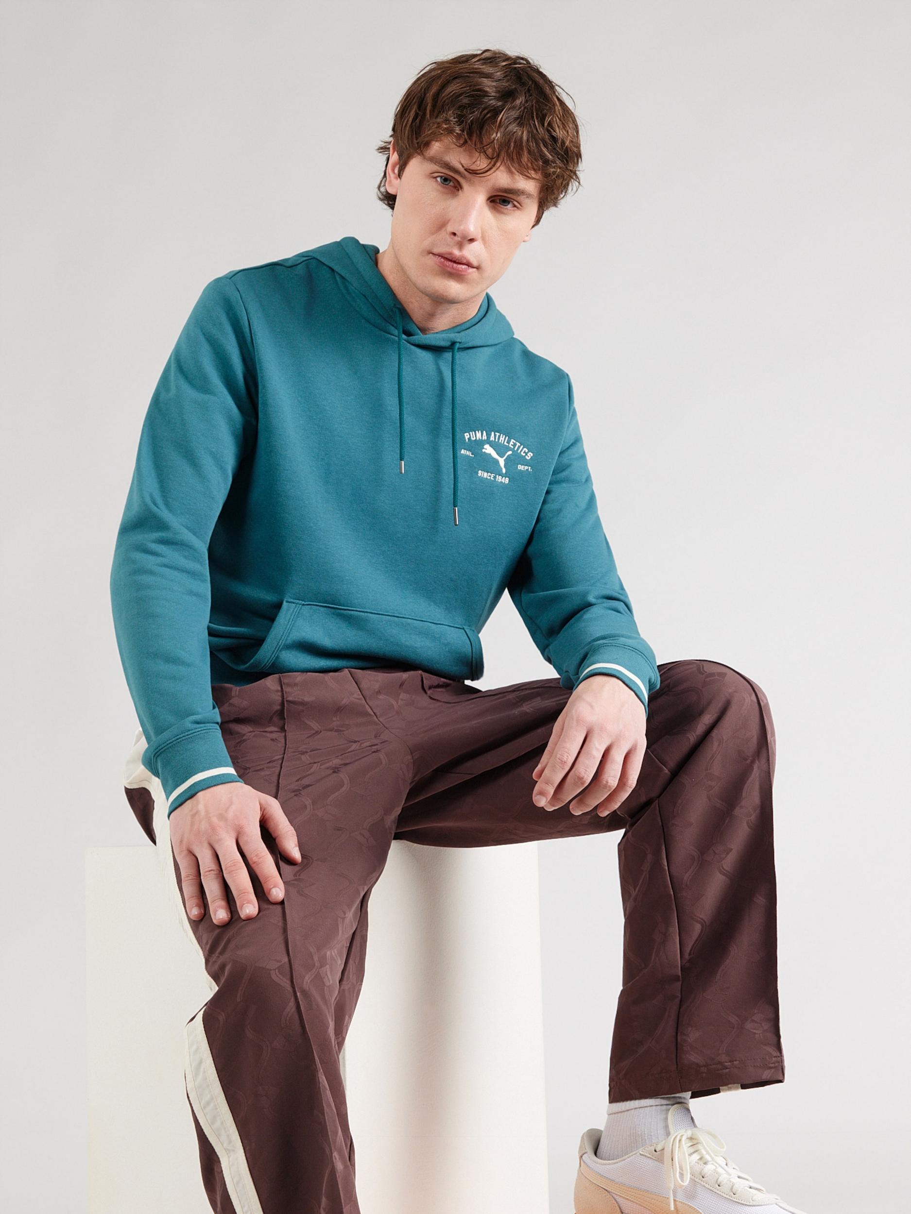 PUMA Megztinis be užsegimo 'CLASS' benzino spalva / balta