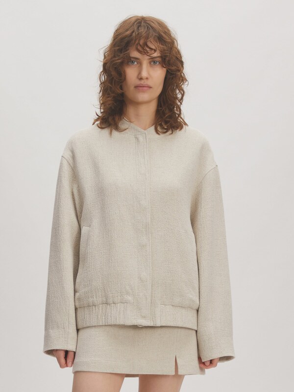 EDITED Demisezoninė striukė 'Malia' smėlio spalva