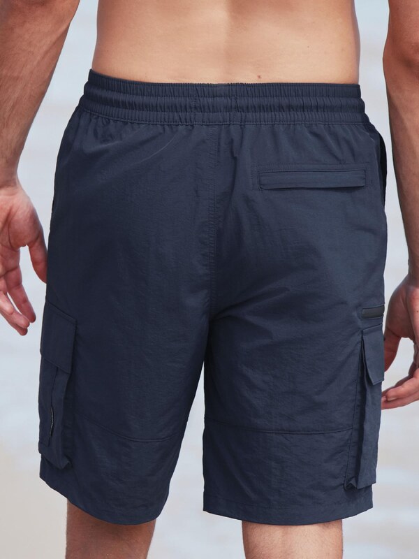 Next Maudymosi trumpikės tamsiai mėlyna